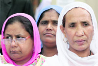 Eyewitnesses in a 1984 riots case outside the Delhi High Court on Monday.