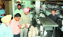 District health officials during an inspection at a hotel in Amritsar on Tuesday.