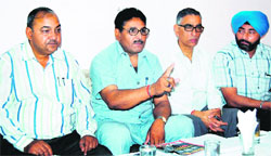 Dr BR Hastir (2nd from left), Chairman, All India Terrorist Victim Association, adresses mediapersons in Amritsar on Tuesday. 