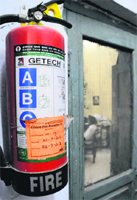 The expired fire extinguisher outside the principals office at Government Rajindra College.