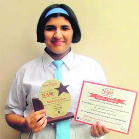 Srishti Guglani with her awards