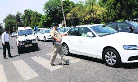 Policemen manage the traffic in Sector 26, Chandigarh