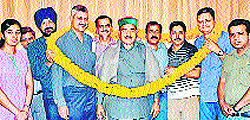Medical officers of the state garland Health Minister Kaul Singh Thakur in Kangra