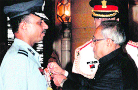 Air Commodore Manvendra Singh being awarded Ati Vishisht Seva Medal by the President of India,