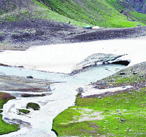 The Sindh flows through a snow cave in Sonamarg, east of Srinagar.