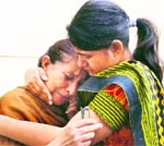 A file photo of Sarabjits sister (L) and his daughter.