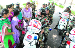 Commandos deputed for Women Helpline spread awareness about the service among students at the Government College for Girls in Patiala on Tuesday.