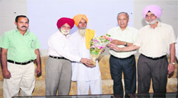 The Vice-Chancellor of the Guru Kashi University, SK Ahluwalia, greets speakers during a May Day seminar organised at Talwandi Sabo to make the students aware of the significance of the day.