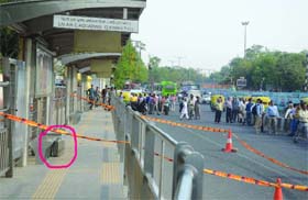 Delhi Police covered the area at a bus stop near Pearey Lal Bhawan, ITO, where a suitcase was found abandoned