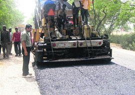 Repair of damaged roads under way in Yamunanagar on Wednesday.