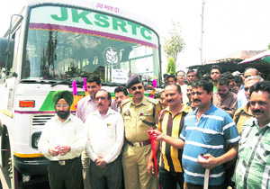Additional Deputy Commissioner, Reasi, Sardar Rajinder Singh Tara, inaugurates the bus service from Reasi to Haridwar in Reasi on Wednesday. 