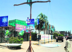 An installation of a scale, the party symbol for Islamic party Jamaat-e-Islami, in Karachi on Wednesday.  AFP
