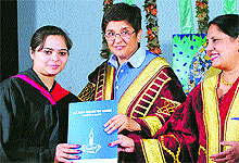 Kiran Bedi gives degree to a student at the convocation of SR Government College in Amritsar on Thursday