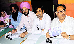Doctors of the Adesh Medical College addressing a press conference over the alleged cheating by the EMO in Bathinda on Thursday
