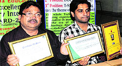 Chairman, SVIET, displays the merit certificates awarded to the institute