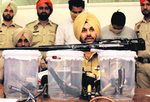 Mohali SSP Gurpreet Singh Bhullar addresses a press conference in Mohali on Thursday.