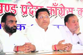Vice-president of the state unit of the Congress Suryakant Dhasmana addresses a press conference in Dehradun on Thursday.