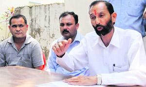 Narender Singh Rawat, vice-president of the UKD, addresses a press conference in Dehradun on Thursday. 