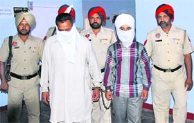 Kanwaljit Singh and Ranjit Singh in police custody in Kapurthala on Thursday