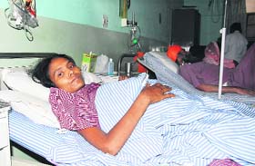 Rekha lies in a hospital in Jalandhar on Thursday
