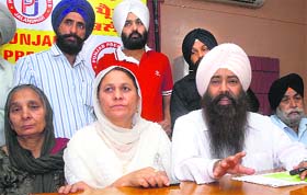 Representatives of the Danga Peerat Welfare Society address mediapersons in Jalandhar on Thursday