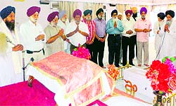 Members of Chief Khalsa Diwan and the staff of its institutions offer an ardaas in Amritsar on Friday
