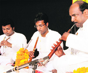 Sanjeev Shankar and Ashwani, shehnai players, perform at a programme organised by SpicMacay at Summer Valley School in Dehradun on Friday. 