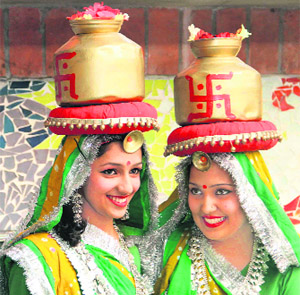 Girls wait for their performance during a function held at Welham Girls School in Dehradun on Friday.