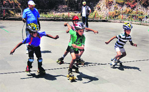Roller skaters in action at the start of the roller skating championship in Mussoorie on Friday. 