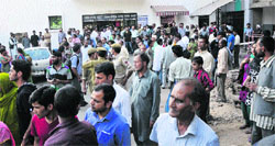 Locals and attendants outside GMCH, Jammu, where Pakistani prisoner Sanaullah was being treated on Friday. Tribune photo: Inderjeet Singh