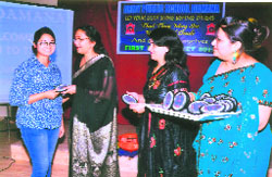 Alumni meet: Principal of Army Public School Damana distributes gifts to alumni at the school on Friday. a Tribune photograph 
