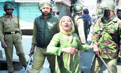 A woman shouts slogan at Maisuma, Srinagar, on Friday. Tribune Photo:Amin War