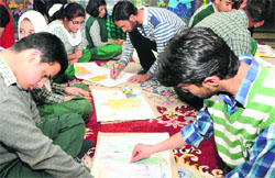 Specially abled children participate in a painting competition at the Sangarmal shopping complex in Srinagar on Friday. Tribune Photo: Amin War