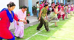 Mothers of students take part in a race at St Anee's School, Mohali, to celebrate Mother's Day on Saturday