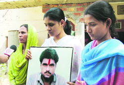 Sarabjits wife and daughters.