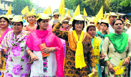 Members of the women cell of the Haryana Janhit Congress protest against increase in the number of rape cases in the state in Karnal on Saturday.