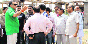 Transport Minister GS Bali inspects the construction site in Nagrota Bagwan constituency on Thursday.