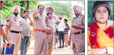 Policemen look for clues at the spot from where the body of a woman, Poonam, was found at Wariana village in Jalandhar on Saturday.