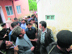 Union Health Minister Ghulam Nabi Azad visits the college building which was damaged in the recent earthquake. A tribune photograph