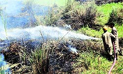 The flames being doused in Jammu on Saturday