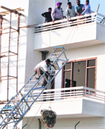 A rescue operation in progress at a farmhouse at Sangowal village of Ludhiana on Friday. Tribune photo: Himanshu Mahajan 