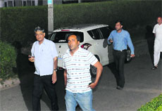 Vijay Singlas relatives arrive at his residence during CBIs raid in Chandigarh on Friday. 