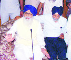 CM Parkash Singh Badal with Surjit Singh Rakhra in Patiala on Saturday.