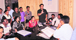 LPG dealers protest before Additional District Magistrate Harak Singh Rawat in Dehradun on Saturday.