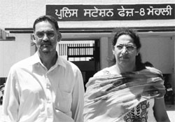 Dr Avtar Singh and his wife, Satinder Kaur, outside the police station in Phase VIII, Mohali, on Sunday. Tr