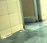 Soiled cotton strewn on the floor.