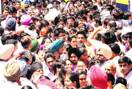 Students come out of the examination centre at Khalsa School, Sector 30, Chandigarh, on Sunday. 