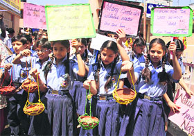 Students participate in an awareness rally Save Birds, Save Nature in Jammu on Saturday.