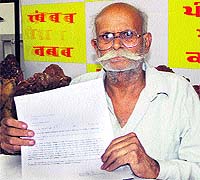 Former Army (Intelligence) member Vasdev Sharma addresses the media in Jalandhar on Sunday