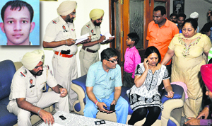 Policemen record the statement of the parents of Sachin 